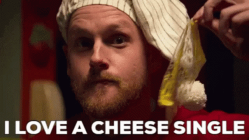 Santa Hat Man Holding Cheese Saying I Love Cheese Single GIF