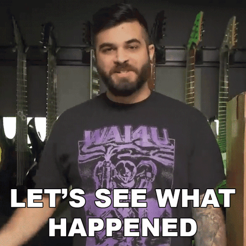 A Man With A Beard Wearing A Shirt That Says Wai4u GIF