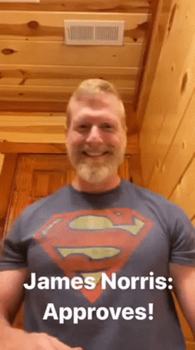 A Man With A Beard Wearing A Superman T-Shirt Says James Norris Approves GIF