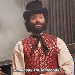 A Man With A Beard Wearing A Top Hat And A Vest Says Somebody Kill Somebody GIF