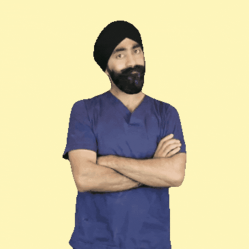 A Man With A Beard Wearing A Turban And A Blue Shirt GIF