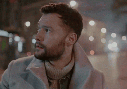 A Man With A Beard Wearing A White Coat GIF