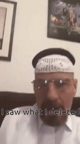 A Man With A Beard Wearing A White Hat And Sunglasses Says " Saw What I Delete " GIF