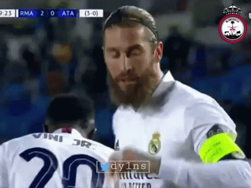 A Man With A Beard Wearing A White Jersey With The Number 20 On It GIF