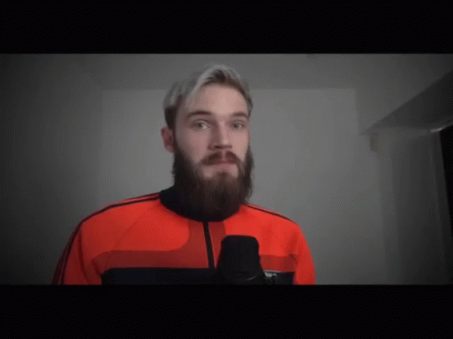 A Man With A Beard Wearing An Adidas Jacket GIF