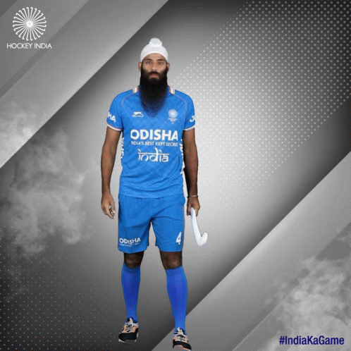 A Man With A Beard Wearing An Odisha Jersey GIF