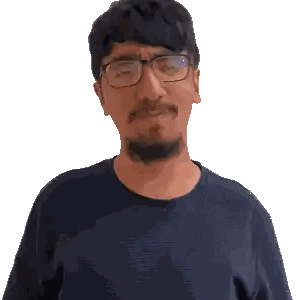 a man with a beard wearing glasses and a black shirt