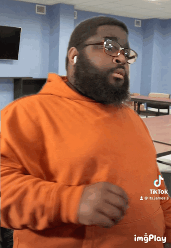 Man With Beard And Glasses With TikTok Account GIF