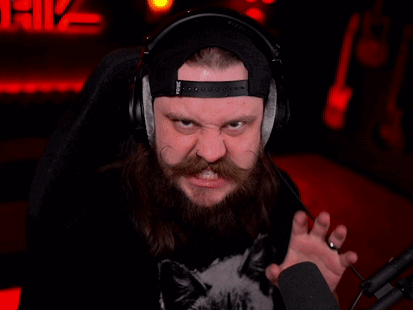 A Man With A Beard Wearing Headphones And A Tattoo On His Arm That Says Flyer GIF