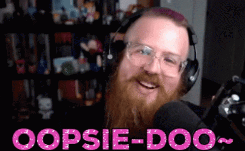 A Man With A Beard Wearing Headphones And Glasses Says Oopsie-Doo In Pink Letters GIF