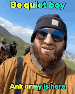 A Man With A Beard Wearing Sunglasses And A Beanie Says " Be Quiet Boy " GIF
