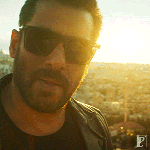 A Man With A Beard Wearing Sunglasses And A Black Shirt GIF
