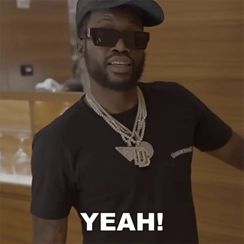 A Man With A Beard Wearing Sunglasses And A Black Shirt Says Yeah GIF