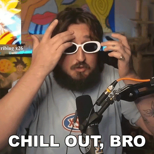 a man with a beard wearing sunglasses and a shirt that says chill out bro