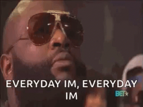 A Man With A Beard Wearing Sunglasses Says Everyday Im Everyday Im GIF
