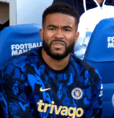 A Man With A Beard Wears A Blue Jersey That Says Trivago GIF
