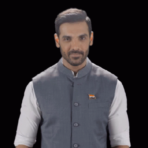 A Man With A Beard Wears A Vest With An Indian Flag On It GIF