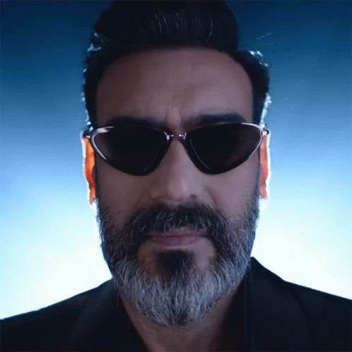 A Man With A Beard Wears Sunglasses And A Black Jacket GIF