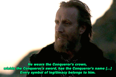 a man with a beard wears the conqueror 's crown and has the conqueror 's sword