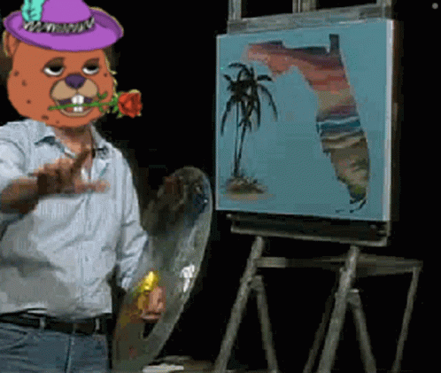 A Man With A Beaver Head Paints A Picture Of Florida On An Easel GIF