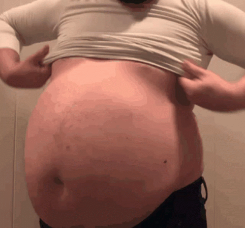 A Man With A Big Belly Is Wearing A White Shirt GIF