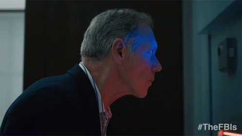 A Man With A Blue Light On His Face Has The Hashtag #Thefbls On The Bottom GIF