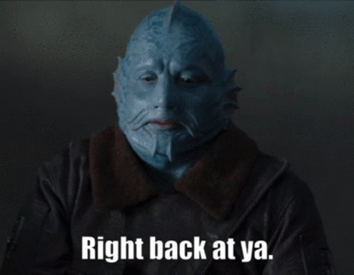 A Man With A Blue Mask On His Face Says Right Back At Ya GIF