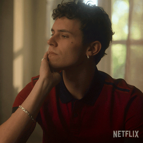 A Man With A Bracelet On His Wrist And A Netflix Logo On The Bottom GIF