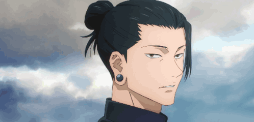 A Man With A Bun On His Head And Earrings GIF