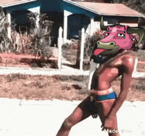 A Man With A Cartoon Bull On His Head GIF