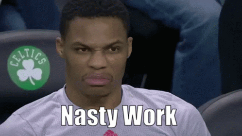 A Man With A Celtics Logo On His Shirt Is Sitting In The Stands And Says Nasty Work GIF