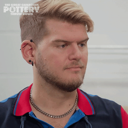 A Man With A Chain Around His Neck Is On The Great Canadian Pottery Throw Down Show GIF