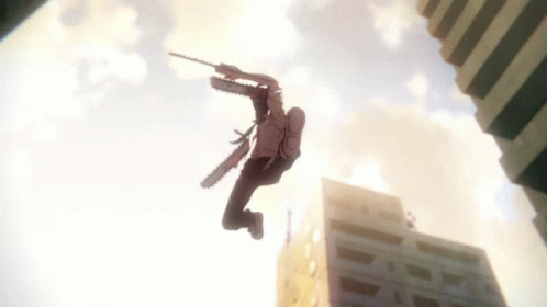 A Man With A Chainsaw On His Back Is Jumping In The Air GIF