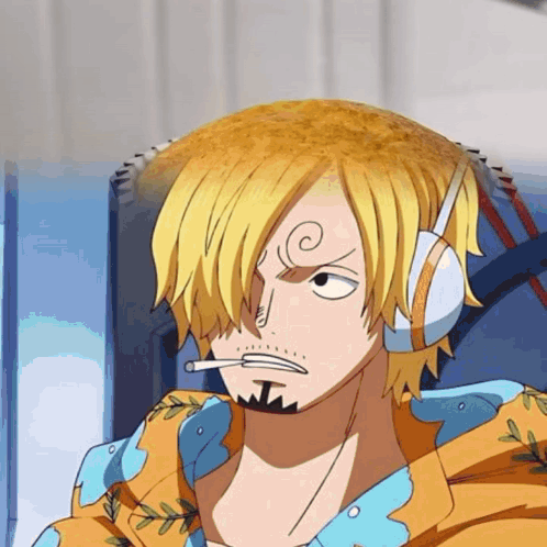 a man with a cigarette in his mouth is wearing headphones