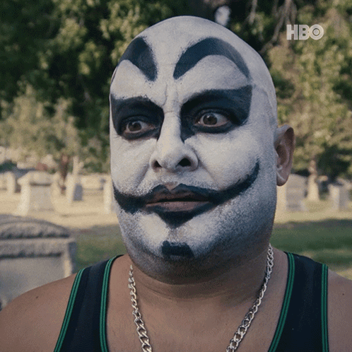 a man with a clown face painted on his face and a hbo logo in the corner