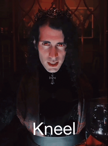 A Man With A Crown On His Head And The Word Kneel On The Bottom GIF