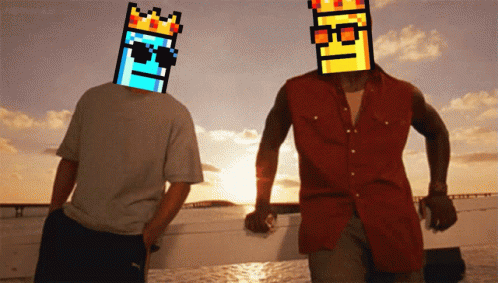 A Man With A Crown On His Head Stands Next To Another Man With A Flame On His Head GIF