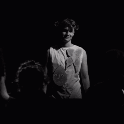 A Man With A Flower Crown On His Head And The Words Feels The Aura Below Him GIF