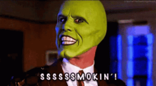 A Man With A Green Mask On His Face Says Ssss Smokin ' ! GIF