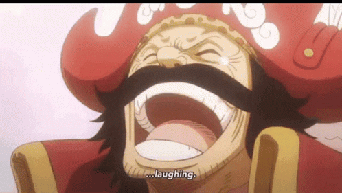 A Man With A Hat And Mustache Is Laughing With His Mouth Open GIF