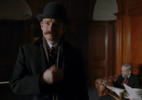 A Man With A Hat And Scarf Says You Are Very ... Ugly GIF