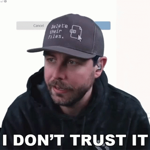 A Man With A Hat That Says Delete Their Files GIF