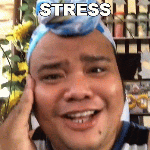 A Man With A Headband On His Head Has The Word Stress Written On His Face GIF