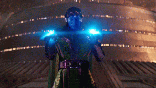 A Man With A Helmet On Is Holding A Blue Light In His Hands GIF