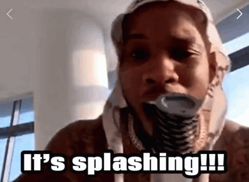 A Man With A Hose In His Mouth Says It 'S Splashing GIF
