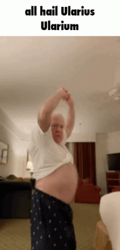 A Man With A Huge Belly Is Standing In A Room With The Words All Hail Ularius Ularium GIF