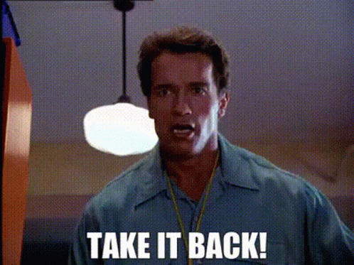 A Man With A Lanyard Around His Neck Says Take It Back . GIF