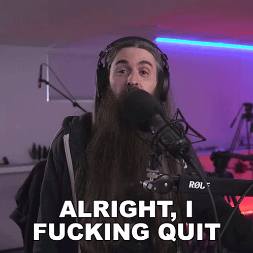 A Man With A Long Beard Stands In Front Of A Rode Microphone And Says Alright I Fucking Quit GIF