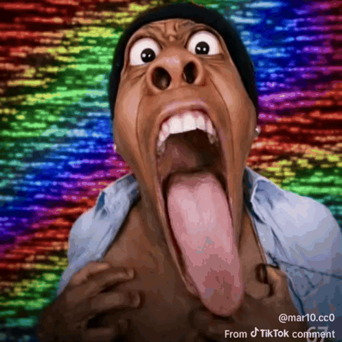 A Man With A Long Tongue Sticking Out And A Rainbow Background GIF