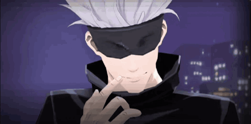 A Man With A Mask On His Face Is Pointing To His Face GIF
